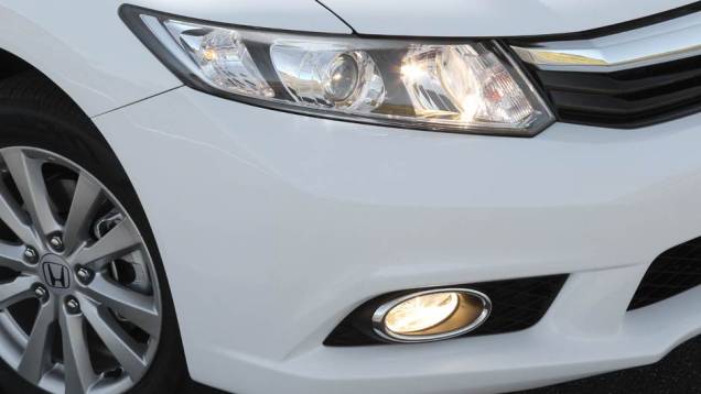 Os preços da linha 2014 variam entre R$ 66.690 (LXS 1.8 manual) e R$ 83.890 (EXR 2.0 automático) | <a href="https://quatrorodas.abril.com.br/noticias/fabricantes/honda-civic-2014-ganha-motor-2-0-730338.shtml" rel="migration">Leia mais</a> Os preços da linha 2014 variam entre R$ 66.690 (LXS 1.8 manual) e R$ 83.890 (EXR 2.0 automático) | <a href="https://quatrorodas.abril.com.br/noticias/fabricantes/honda-civic-2014-ganha-motor-2-0-730338.shtml" rel="migration">Leia mais</a>