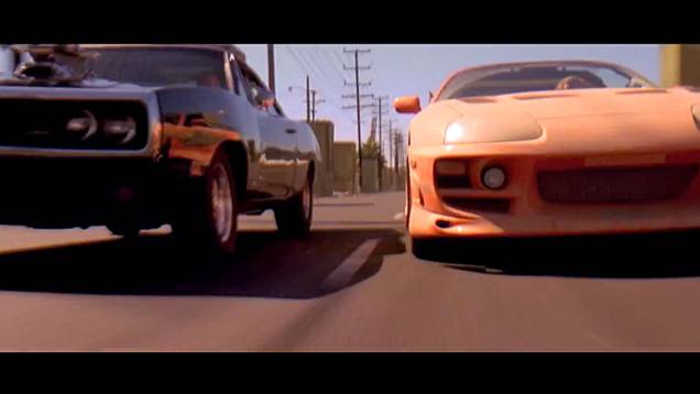 Velozes e Furiosos (2001) - Paul Walker, com um Toyota Supra 1995 nitrado, e Vin Diesel, com um Charger 1970 preparado, alopram pelas ruas de Los Angeles, numa trama que se passa no universo dos rachas. <a href="%20https://quatrorodas.abril.com.br/blogs/plan" rel="migration"></a>