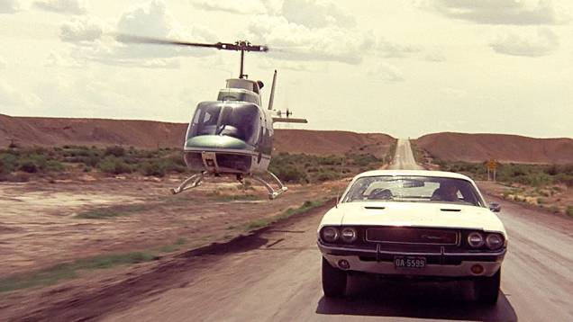 Corrida Contra o Destino (1971) - Pode o mito de um carro nascer no cinema? Sim, é o caso do Dodge Challenger, produzido só de 1970 a 1974, ocaso dos pony-cars, mas sempre lembrado pelo filme. <a href="%20https://quatrorodas.abril.com.br/blogs/planeta-carro/" rel="migration"></a> Corrida Contra o Destino (1971) - Pode o mito de um carro nascer no cinema? Sim, é o caso do Dodge Challenger, produzido só de 1970 a 1974, ocaso dos pony-cars, mas sempre lembrado pelo filme. <a href="%20https://quatrorodas.abril.com.br/blogs/planeta-carro/" rel="migration"></a>