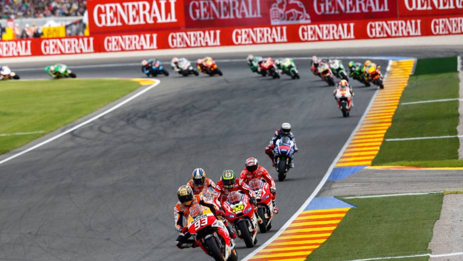 Valência foi o palco da última etapa da temporada 2014 da MotoGP. | <a href="https://quatrorodas.abril.com.br/moto/noticias/motogp-marquez-vence-quebra-recorde-vitoria-temporada-811357.shtml" rel="migration">Leia mais</a>