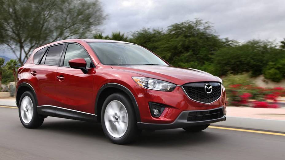 Motor é 2.0 a gasolina | <a href="https://quatrorodas.abril.com.br/reportagens/salao/mazda-cx-5-646622.shtml" rel="migration">Leia mais</a>