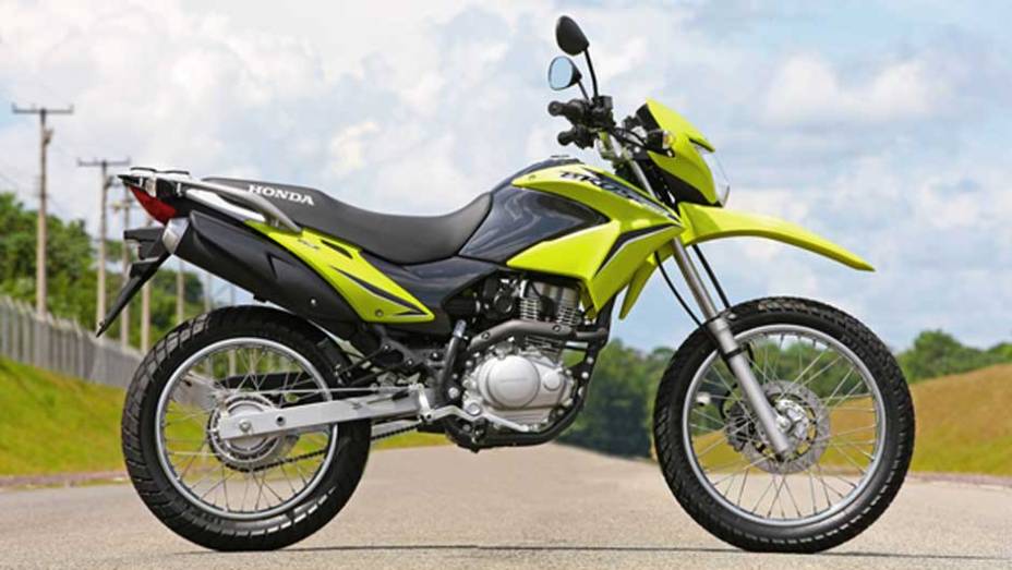 As mudanças surgem na nova carenagem, que incorpora um farol mais potente | <a href="https://quatrorodas.abril.com.br/moto/noticias/nxr-150-bros-quase-inalterada-691995" rel="migration"></a>