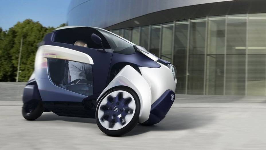 Toyota i-Road | <a href="https://quatrorodas.abril.com.br/saloes/genebra/2013/toyota-i-road-735128.shtml" rel="migration">Leia mais</a>