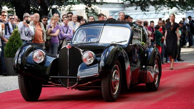 Bugatti 57SC 1938 | <a href="https://quatrorodas.abril.com.br/noticias/fabricantes/bugatti-1938-ralph-lauren-vence-concurso-elegancia-742534.shtml" rel="migration">Leia mais</a> Bugatti 57SC 1938 | <a href="https://quatrorodas.abril.com.br/noticias/fabricantes/bugatti-1938-ralph-lauren-vence-concurso-elegancia-742534.shtml" rel="migration">Leia mais</a>