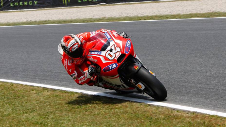 Andrea Dovizioso | <a href="https://quatrorodas.abril.com.br/moto/noticias/motogp-pedrosa-largara-frente-barcelona-786152.shtml" rel="migration">Leia mais</a>