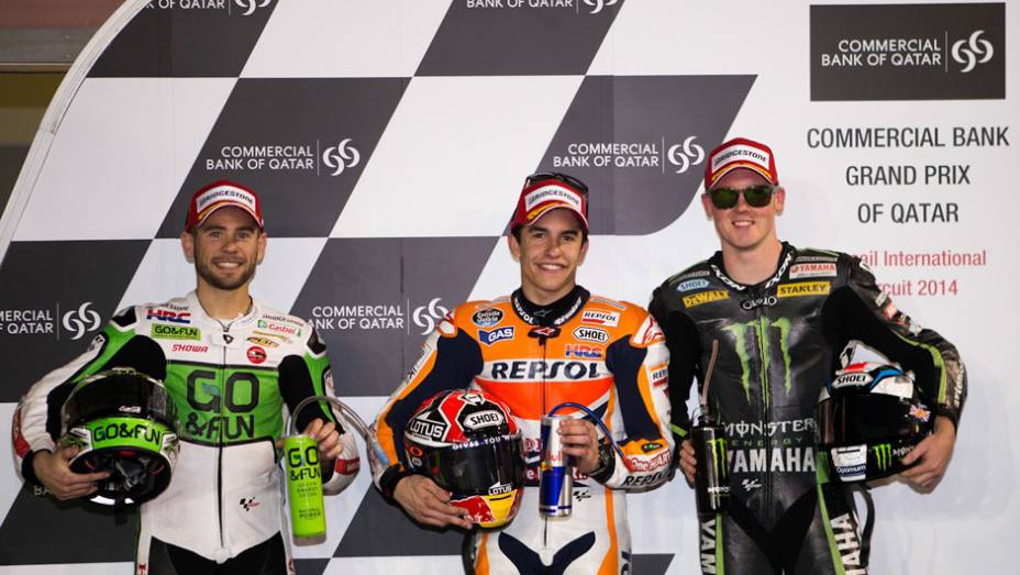 O atual campeão da MotoGP Marc Márquez é o pole position, para a primeira etapa da MotoGP de 2014. Álvaro Bautista e Bradley Smith, estão na primeira fila. | <a href="https://quatrorodas.abril.com.br/moto/noticias/marc-marquez-pole-primeira-etapa-ano-moto" rel="migration"></a>