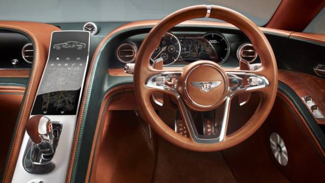 Câmbio cromado e navegador touch screen surgem no meio do console | <a href="https://quatrorodas.abril.com.br/noticias/saloes/detroit-2015/bentley-revela-conceito-exp-10-speed-6-genebra-842760.shtml" rel="migration">Leia mais</a>