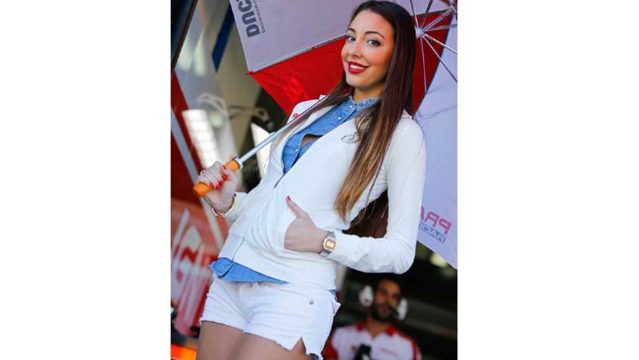 Veja as belas Garotas da MotoGP - Valencia | <a href="https://quatrorodas.abril.com.br/moto/noticias/lorenzo-vence-nao-impede-titulo-marquez-759873.shtml" rel="migration">Leia mais</a>