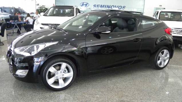 Hyundai Veloster | <a href="https://quatrorodas.abril.com.br/noticias/veloster-elantra-ja-estao-venda-concessionarias-hyundai-303518_p.shtml" rel="migration">Leia mais</a>