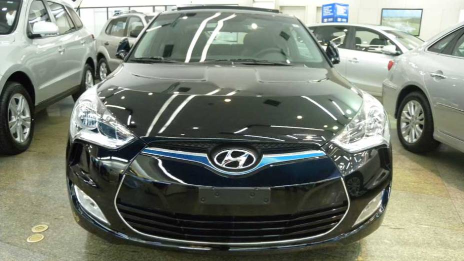 Hyundai Veloster | <a href="https://quatrorodas.abril.com.br/noticias/veloster-elantra-ja-estao-venda-concessionarias-hyundai-303518_p.shtml" rel="migration">Leia mais</a>