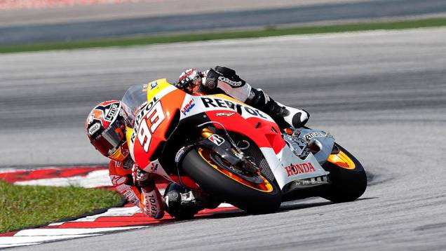 Marc Márquez garantiu o terceiro tempo na Malásia. <a href="https://quatrorodas.abril.com.br/moto/noticias/motogp-pedrosa-mais-rapido-sepang-734603.shtml" rel="migration">Leia mais</a>