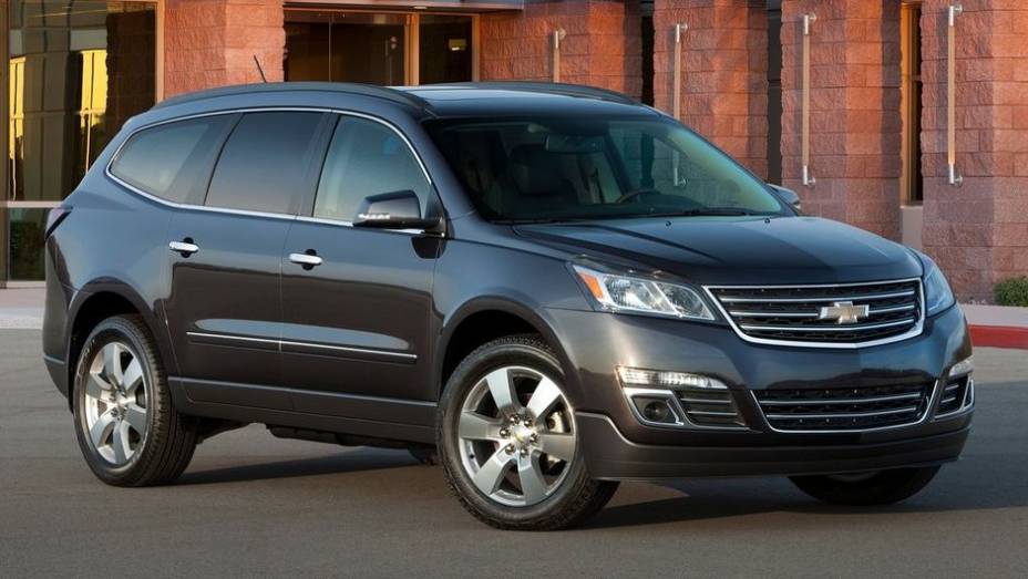 SUVs médios de 3 fileiras - 2013 Chevrolet Traverse - Preço inicial nos EUA: US$ 30.510 - Preço inicial no Brasil: não é vendido | <a href="%20https://quatrorodas.abril.com.br/noticias/mercado/gm-domina-premio-best-cars-for-families-2013-738171.shtml" rel="migration">Leia m</a>