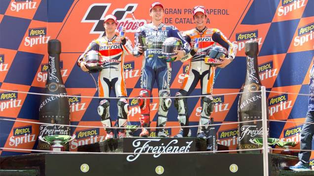 Espanhóis dominam o pódio, mais uma vez | <a href="https://quatrorodas.abril.com.br/moto/noticias/motogp-lorenzo-domina-gp-catalunha-744220.shtml" rel="migration">Leia mais</a> Espanhóis dominam o pódio, mais uma vez | <a href="https://quatrorodas.abril.com.br/moto/noticias/motogp-lorenzo-domina-gp-catalunha-744220.shtml" rel="migration">Leia mais</a>