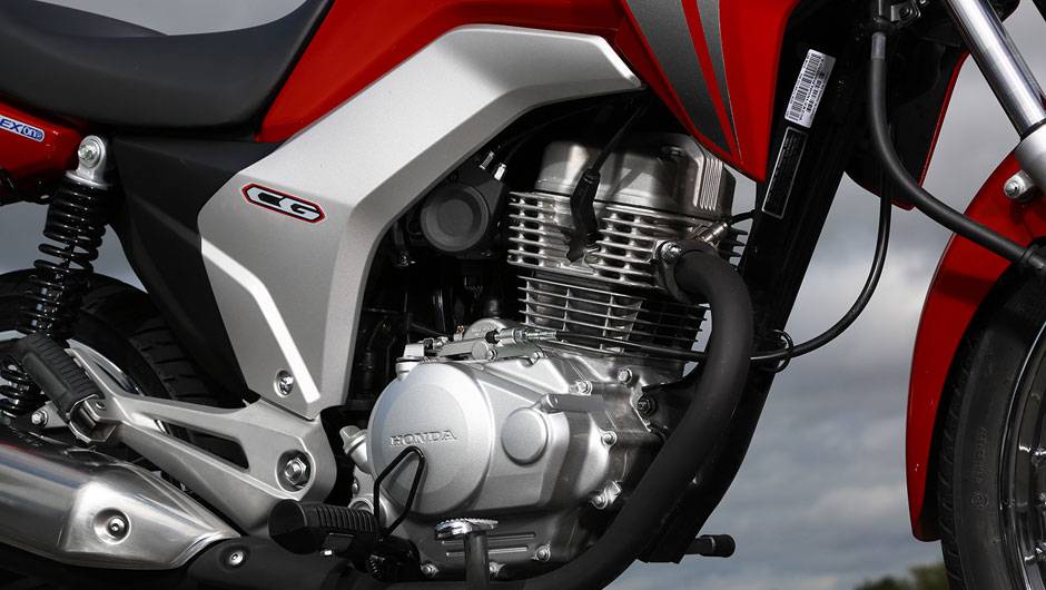 A linha CG 150 apresenta o motor OHC de 149,2 cm&sup3; e quatro tempos com sistema Flex | <a href="https://quatrorodas.abril.com.br/moto/noticias/honda-lanca-cg-2014-totalmente-renovada-748587.shtml" rel="migration">Leia mais</a>