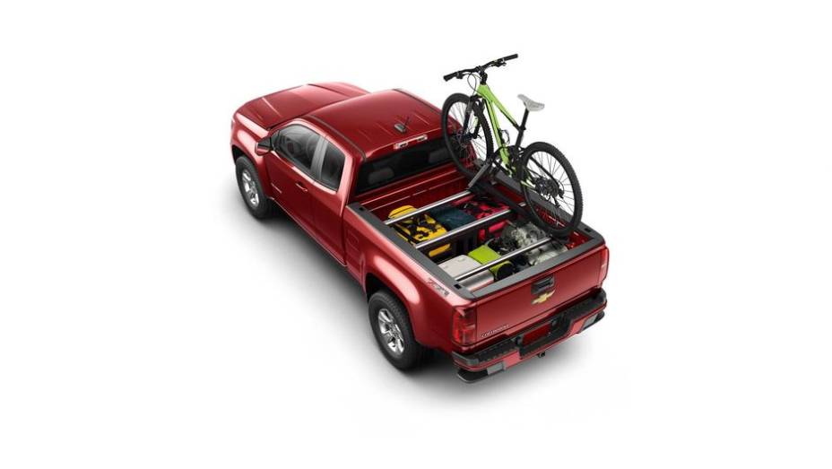A promessa é de que a nova Colorado seja líder em termos de capacidade de carga, além de poder puxar um trailer de até 3.039 kg | <a href="https://quatrorodas.abril.com.br/noticias/saloes/los-angeles-2013/chevrolet-apresenta-nova-colorado-760712.shtml" rel="migration">Lei</a>