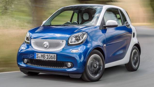 Smart ForTwo | <a href="https://quatrorodas.abril.com.br/noticias/mercado/candidatos-carro-ano-2015-europa-sao-revelados-791548.shtml" rel="migration">Leia mais</a>