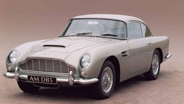 DB5 (1963): sinônimo de Aston Martin, este belo cupê de design italiano acompanhou James Bond em Goldfinger, clássico da saga 007 lançado em 1964; apareceu também em Skyfall (2012), último filme do agente secreto