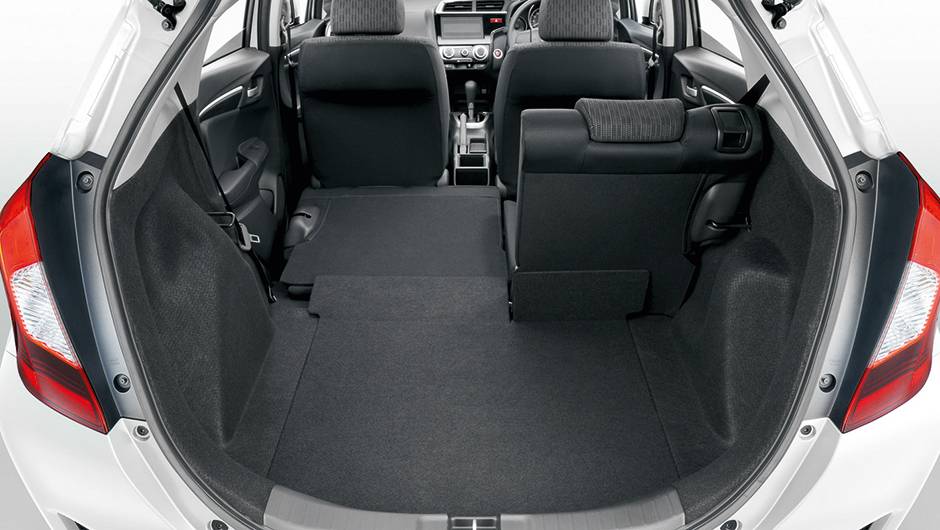 Fit manteve a grande modularidade interna dos bancos | <a href="https://quatrorodas.abril.com.br/carros/impressoes/honda-fit-765447.shtml" rel="migration">Leia mais</a>