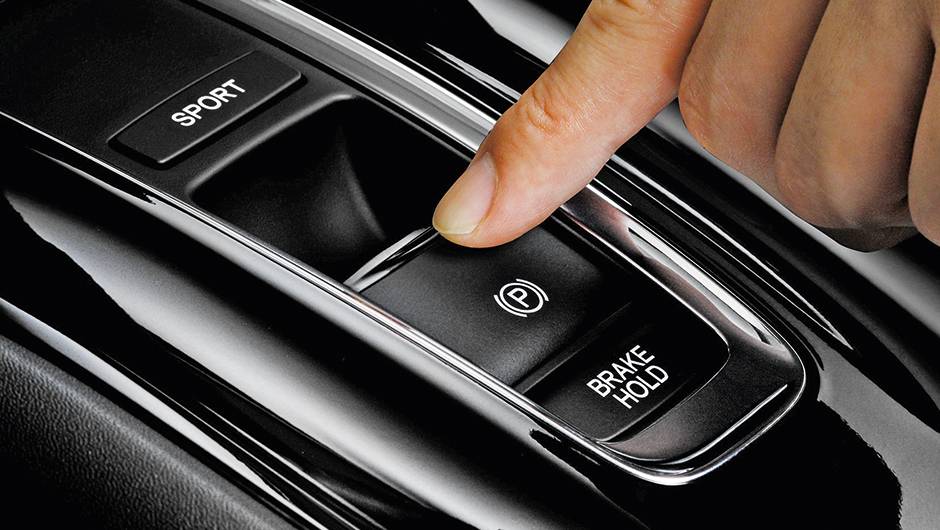 Vers&atilde;o h&iacute;brida tem alavanca de c&acirc;mbio minimalista, com modo Park por tecla | <a href="https://quatrorodas.abril.com.br/carros/impressoes/honda-vezel-777550.shtml" rel="migration">Leia mais</a>
