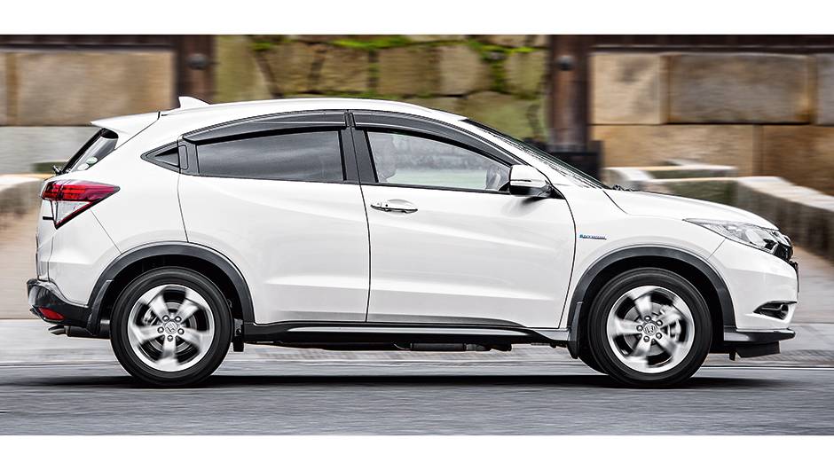 A ma&ccedil;aneta traseira fica embutida no batente | <a href="https://quatrorodas.abril.com.br/carros/impressoes/honda-vezel-777550.shtml" rel="migration">Leia mais</a>