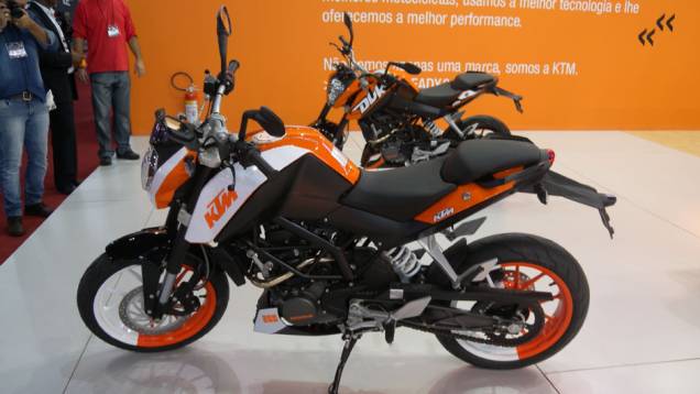 Modelo está em exposição no estande da marca | <a href="https://quatrorodas.abril.com.br/moto/noticias/ktm-revela-novidades-vem-brasil-642407.shtml" rel="migration">Leia mais</a> Modelo está em exposição no estande da marca | <a href="https://quatrorodas.abril.com.br/moto/noticias/ktm-revela-novidades-vem-brasil-642407.shtml" rel="migration">Leia mais</a>
