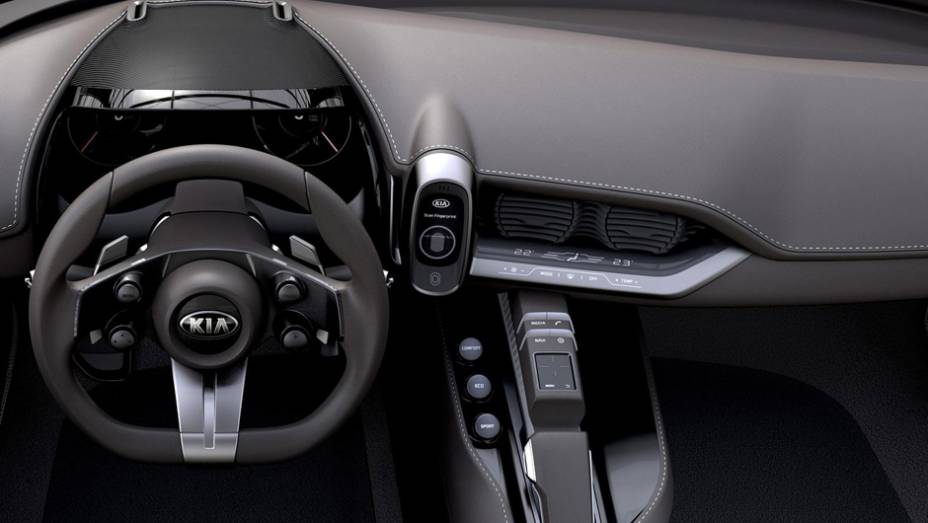 Interior é minimalista com poucos botões e dispositivos, tudo sendo controlado por uma tela ao lado do volante | <a href="https://quatrorodas.abril.com.br/noticias/fabricantes/kia-revela-conceito-novo-seul-852727.shtml" target="_blank" rel="migration">Leia mais</a>