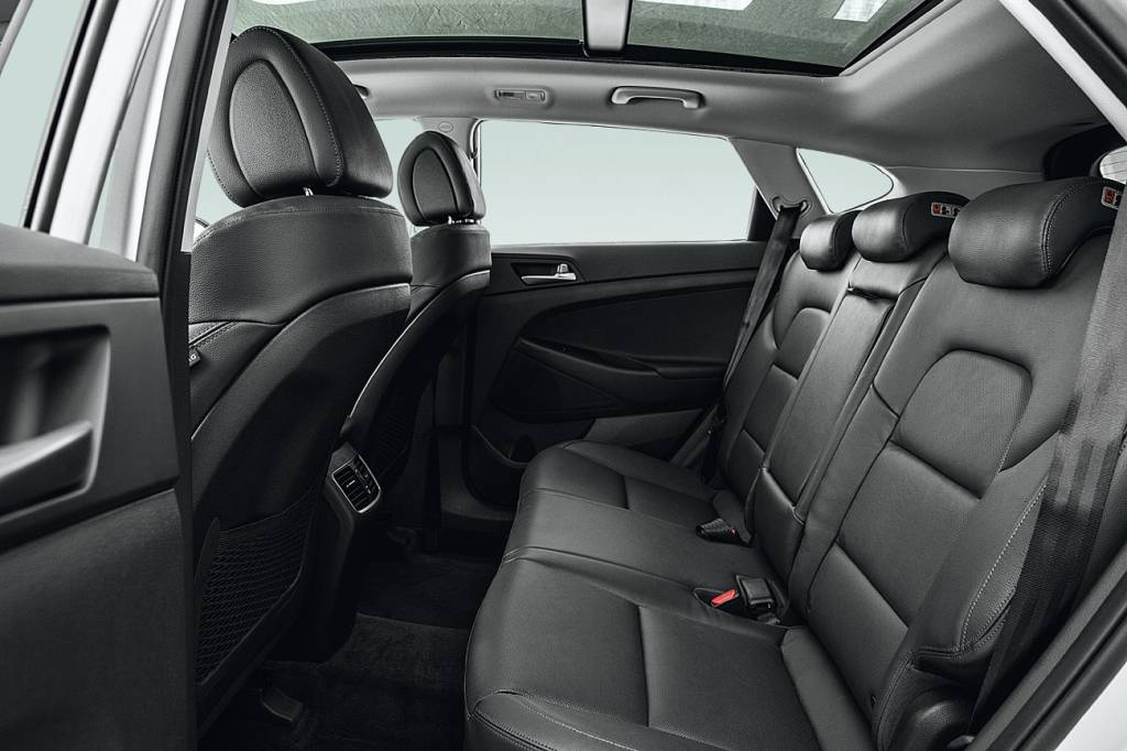 Hyundai New Tucson Espaço para os passageiros de trás é generoso, com saídas de ar-condicionado dedicadas