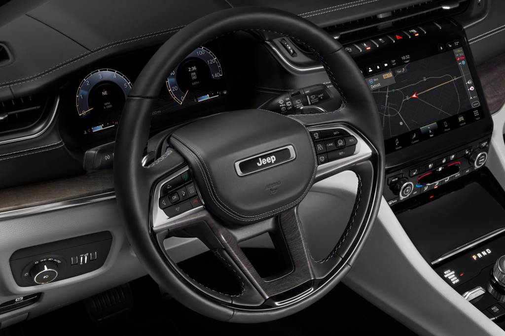 The all-new 2021 Jeep® Grand Cherokee L Overland leather-wrapped multifunction steering wheel complements the new finely crafted leather-wrapped, stitched instrument panel.