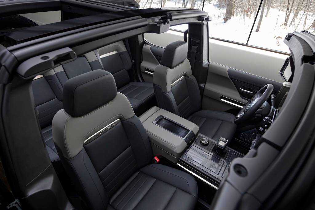 The GMC HUMMER EV SUV debuts in the low-contrast Lunar Shadow interior and includes a spacious cargo area and an architecturally inspired cabin. The GMC HUMMER EV SUV debuts in the low-contrast Lunar Shadow interior and includes a spacious cargo area and an architecturally inspired cabin.