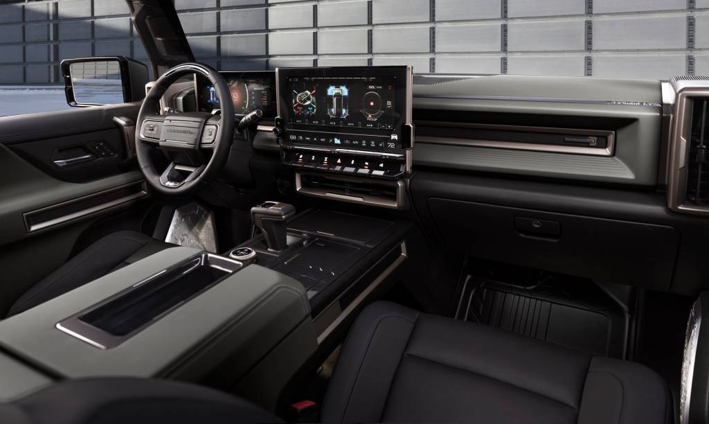 The GMC HUMMER EV SUV debuts in the low-contrast Lunar Shadow interior and includes a spacious cargo area and an architecturally inspired cabin.