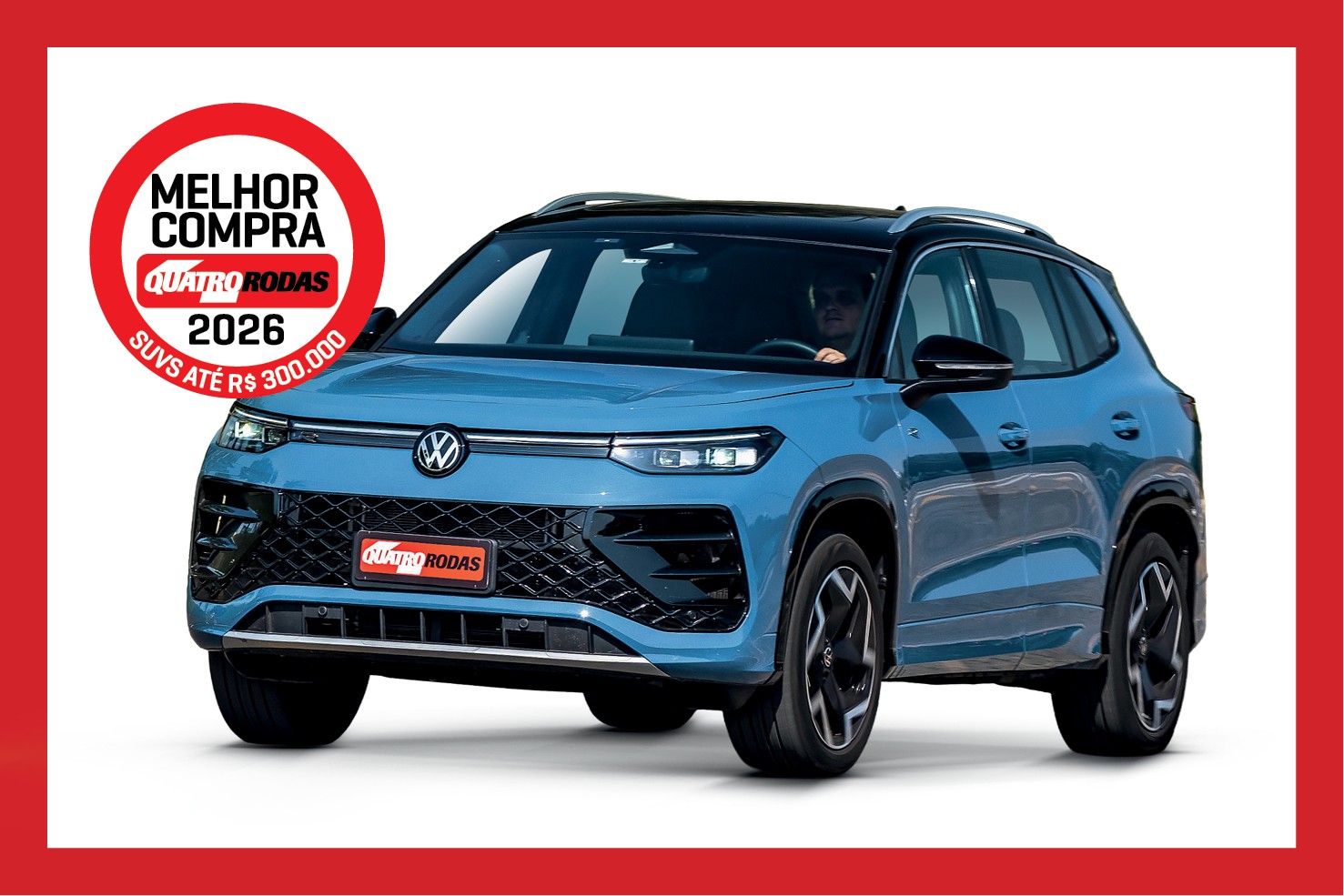 SUV Volkswagen azul-claro com teto preto, rodas escuras e detalhes cromados, em fundo branco com borda vermelha. No canto superior esquerdo, um selo circular vermelho e branco indica MELHOR COMPRA QUATRO RODAS 2026 SUVs ATÉ R$ 300.000
