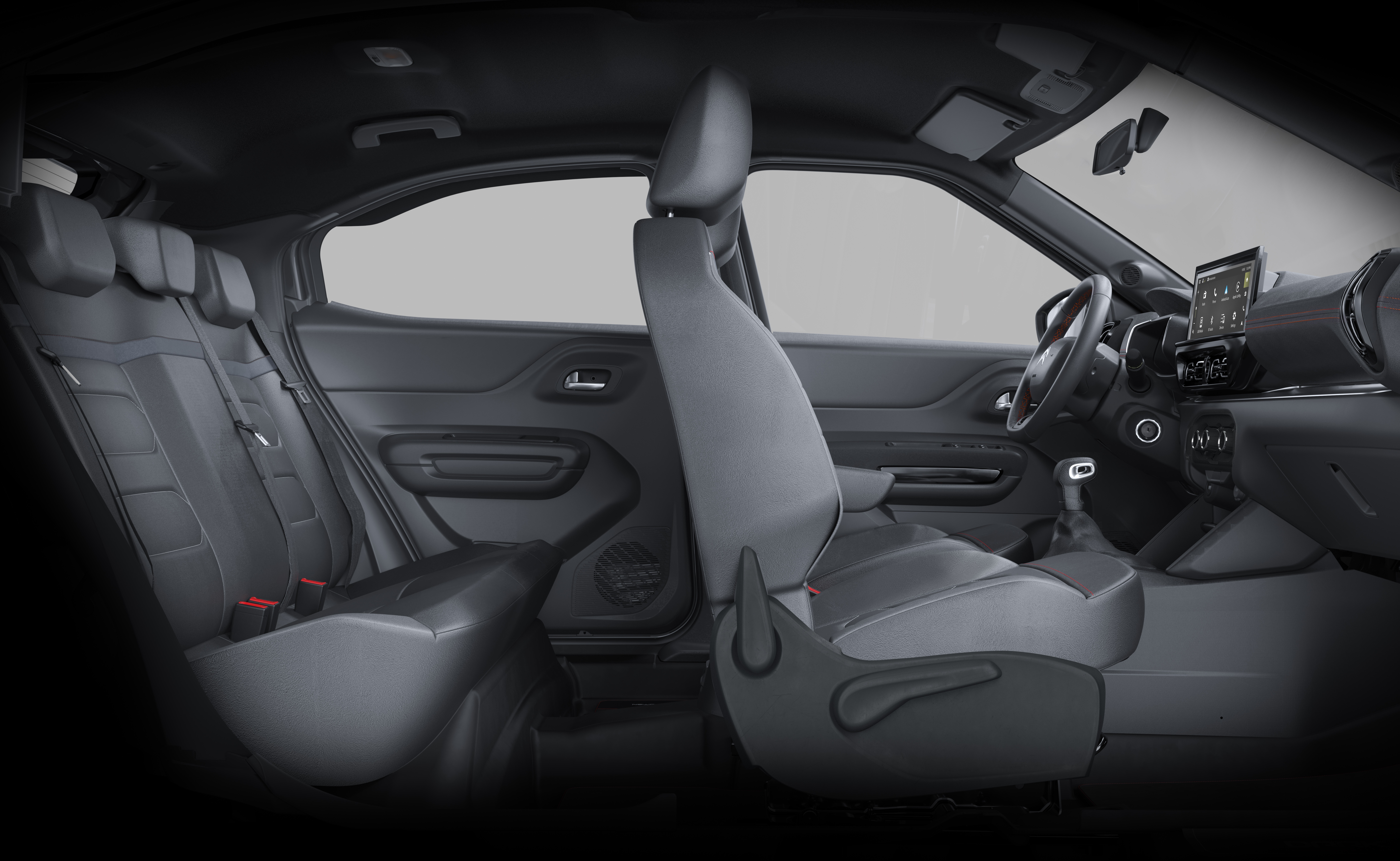 Interior de um carro com bancos cinza escuro, volante e painel com tela multimídia. O banco do motorista está rebatido para frente, mostrando o espaço traseiro com três encostos de cabeça e cintos de segurança. As portas têm acabamento escuro e detalhes em relevo. A iluminação é suave, destacando os assentos e o console central.